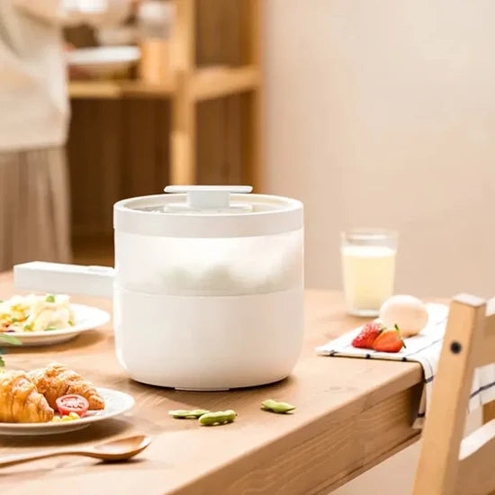 Multifunctional Electric Cooker 2L 700W with Ceramic Glaze Inner Pot
قدر طبخ كهربائي متعدد الوظائف 2 لتر 700 واط مع وعاء داخلي بطبقة سيراميك