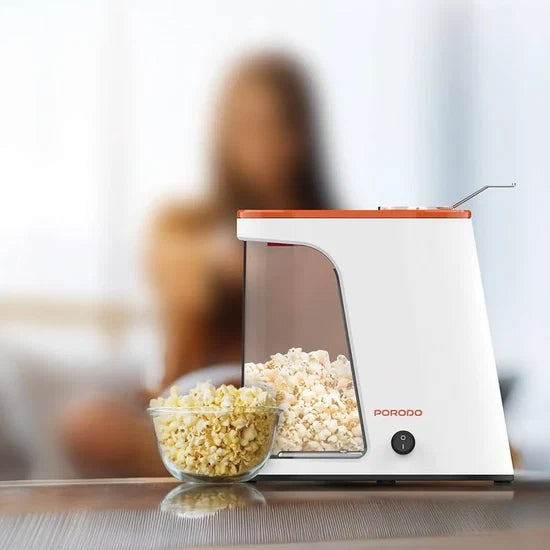 Porodo 1200W oil-free hot air popcorn maker with 60g capacity for fast popcorn preparation
ماكينة فشار Porodo بقدرة 1200 واط تعمل بالهواء الساخن بدون زيت بسعة 60 غرام لتحضير الفشار بسرعة